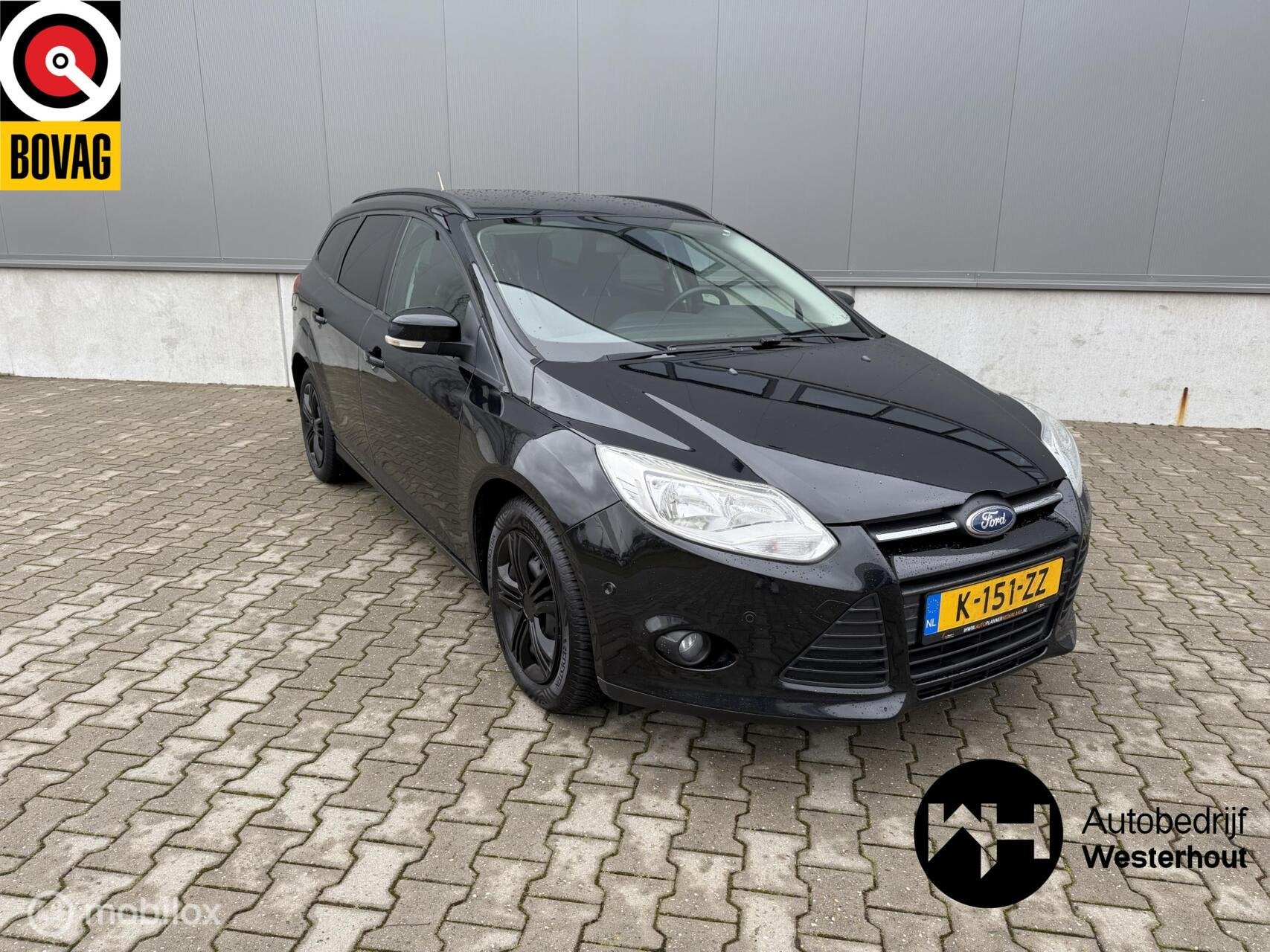 Ford Focus Wagon 1.0 EcoBoost Titanium NWE APK Parkeer Assis, Auto's, 101 pk, Gebruikt, Zwart, Handgeschakeld