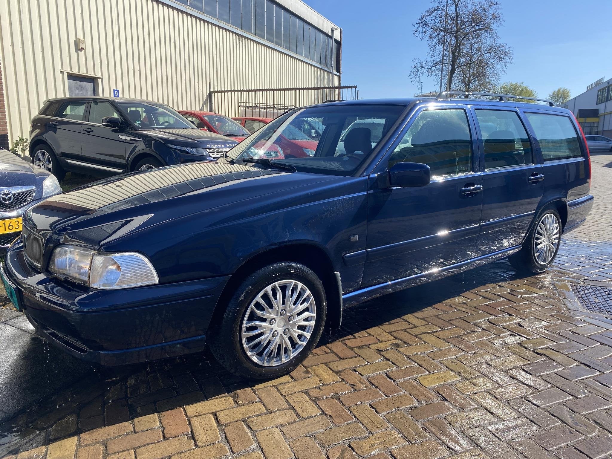 Volvo V70 2.5-20V Comfort Luxury, Auto's, Stof, Gebruikt, Blauw, 1600 kg