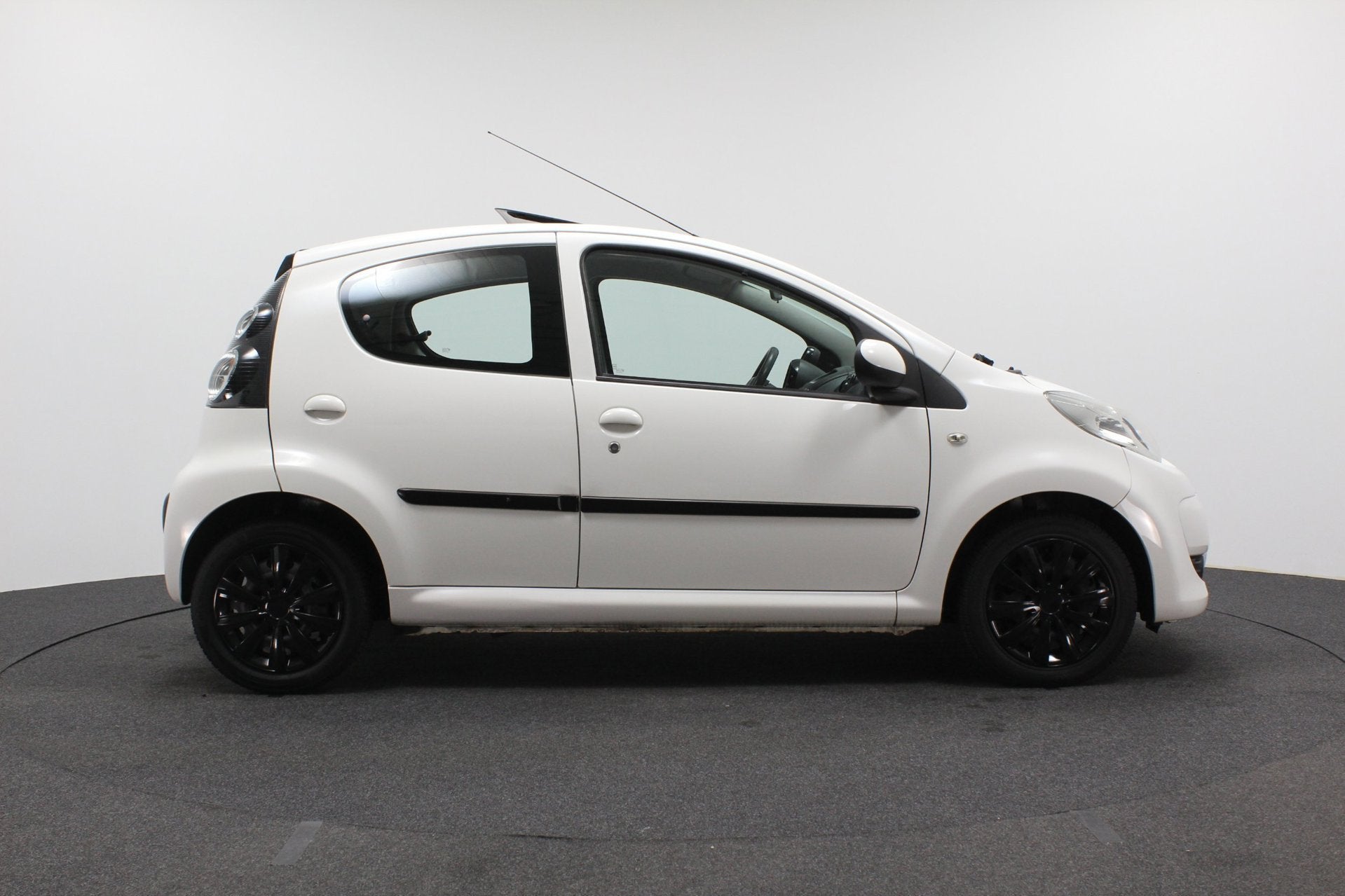 Citroen C1 1.0-12V Exclusive | Airco | Open dak | Elektrisch, Voorwielaandrijving, Euro 5, Gebruikt, 4 stoelen