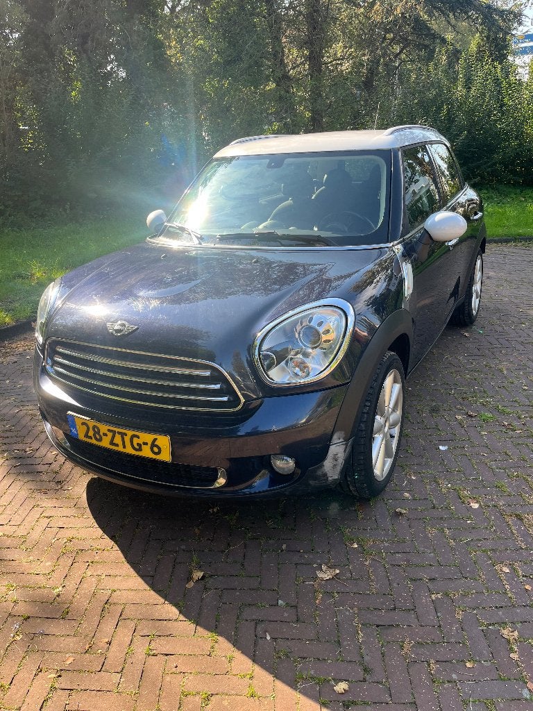 Mini Countryman 1.6 Cooper 2011 met schade, Voorwielaandrijving, Blauw, Leder en Stof, 122 pk