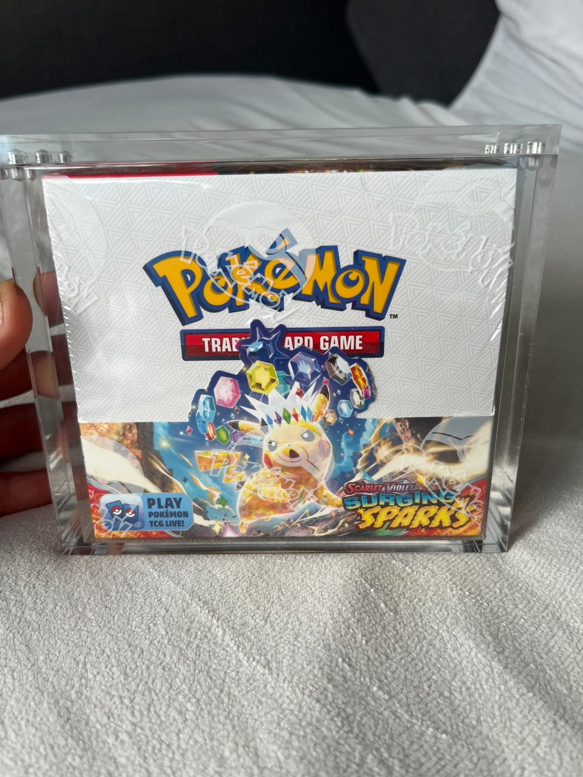 Pokemon Surging Sparks Booster Box, Nieuw met Acryl, Ophalen of Verzenden, Zo goed als nieuw