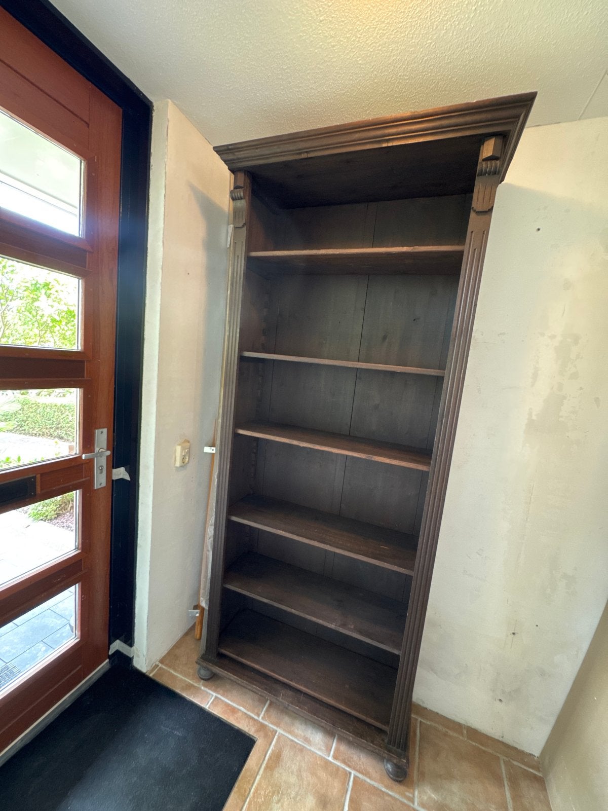 Antieke houten boekenkast met sierlijke details, Ophalen