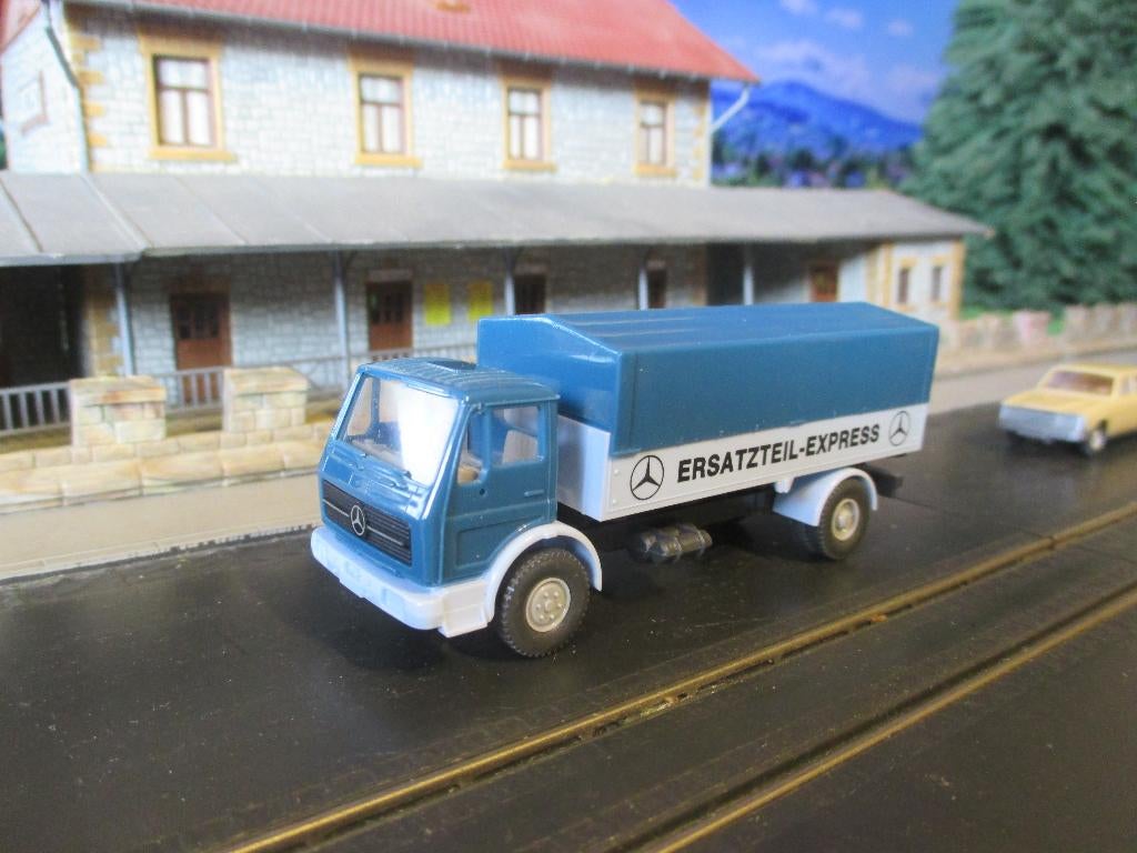 Mercedes Benz NG 1017 - Wiking Ersatzteil-Express met huif, Hobby en Vrije tijd, Modelauto's | 1:87, Zo goed als nieuw, Bus of Vrachtwagen