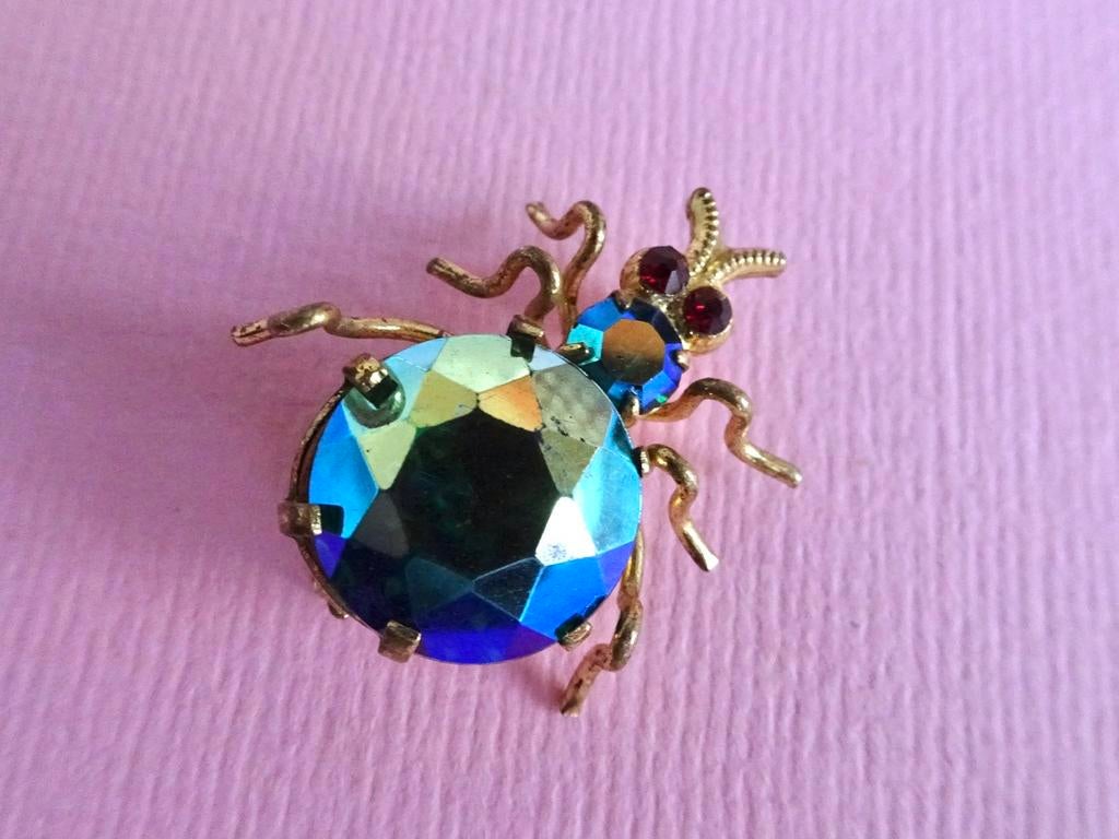 jwg Art Deco 30s aurora borealis spin insect broche gekleurd, Sieraden, Tassen en Uiterlijk, Antieke sieraden, Verzenden, Overige materialen