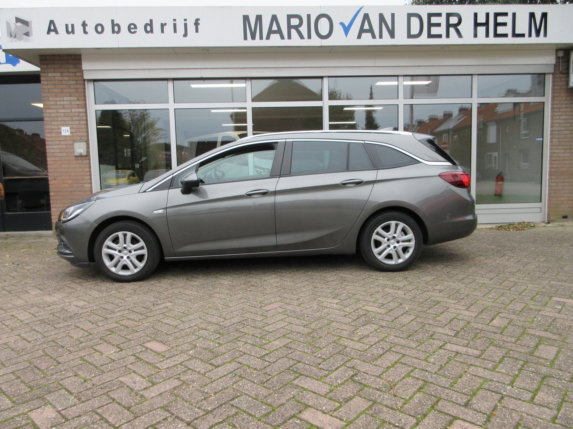 Opel Astra Sports Tourer 1.0 Online Edition Airco/Navigatie, Auto's, Voorwielaandrijving, Stof, Gebruikt, 1178 kg