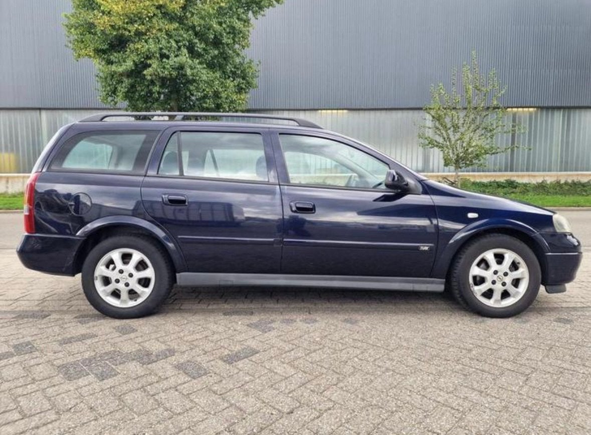 Opel Astra 1.6 8V St.wgn. AUT 2003 Blauw, 4 cilinders, Blauw, Origineel Nederlands, Stationwagon