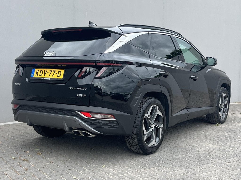 Hyundai Tucson 1.6 T-GDI PHEV Premium Sky 4WD / Panorama sch, Auto's, Hyundai, 1350 kg, 14 kWh, Gebruikt, Euro 6