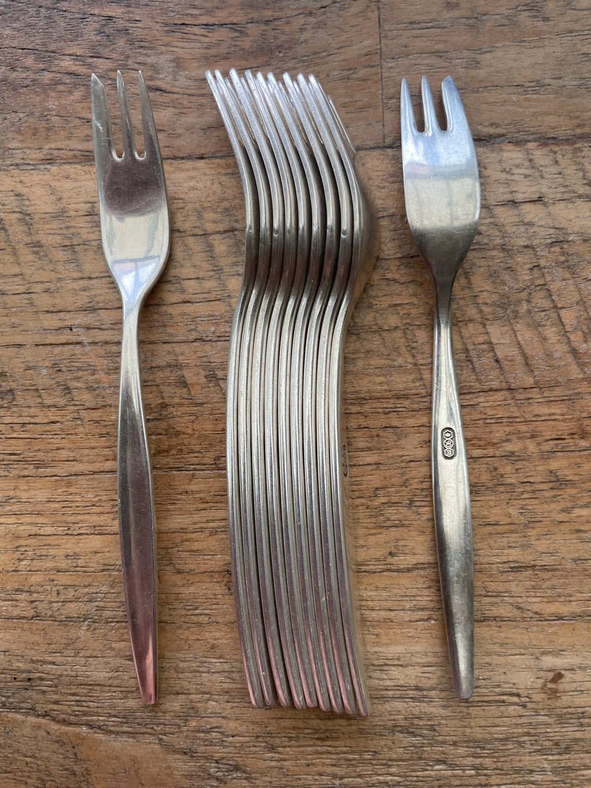 Set van 11 verzilverde gebaksvorkjes - GERO, Antiek en Kunst, Antiek | Bestek, Ophalen of Verzenden