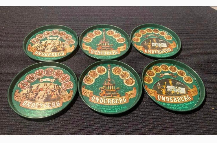 6 Ronde metalen onderzetters van het merk Underberg. D. 8 cm, Ophalen of Verzenden, Zo goed als nieuw, Overige typen