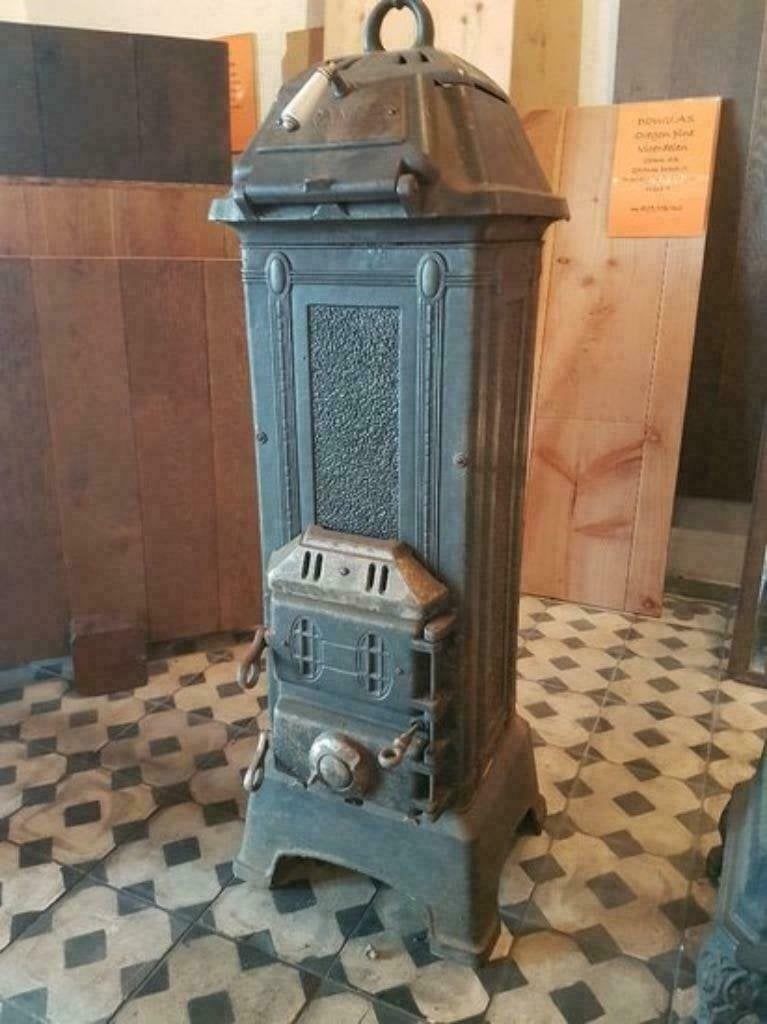 ANTIEKE GIETIJZEREN OUDE POTKACHEL HOUTKACHEL MERK ORANIER, Ophalen of Verzenden
