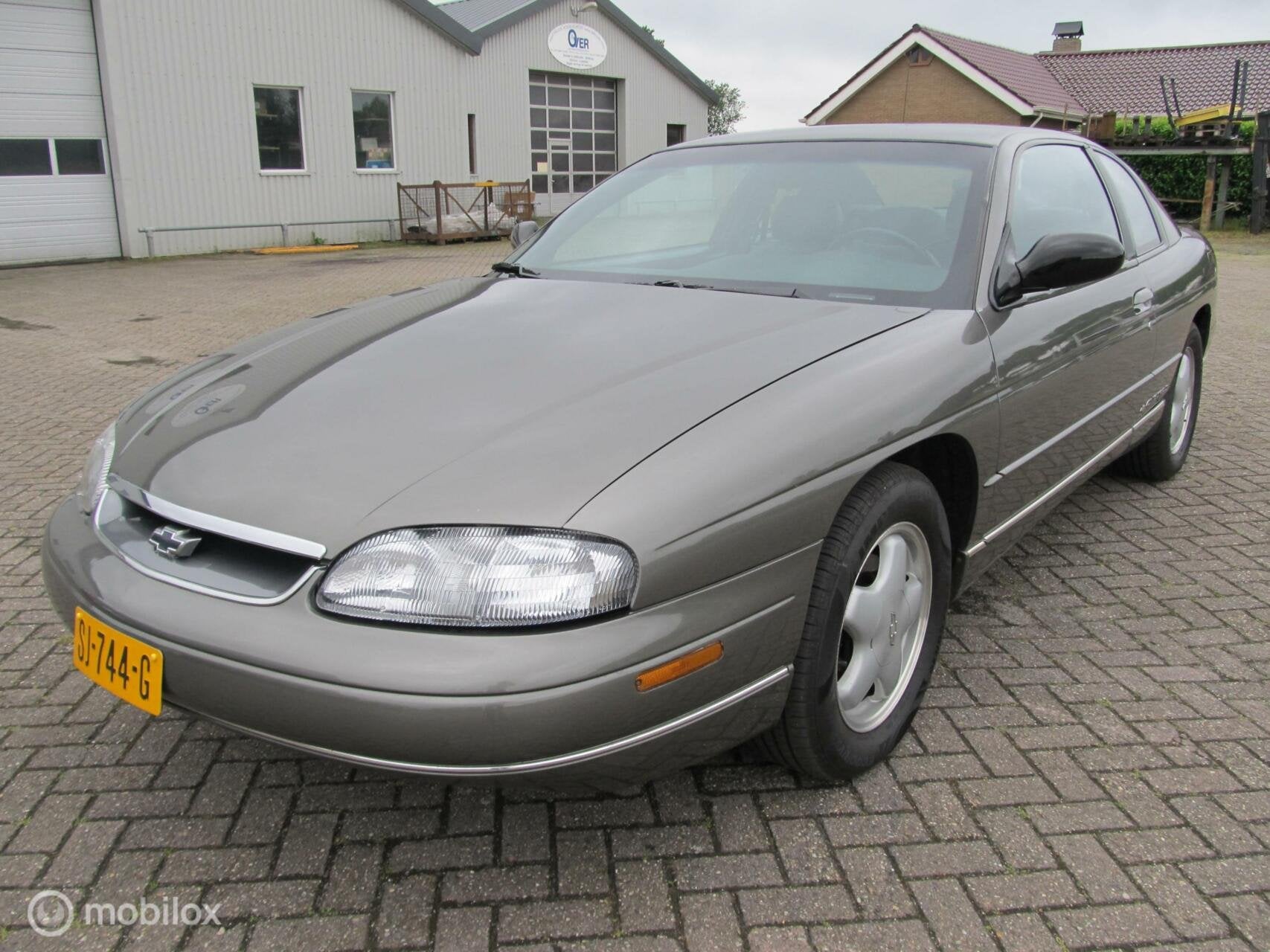 unieke monte carlo coupe V6 met 121538 km origineel,zeldzaam, Auto's, Chevrolet, 3100 cc, Gebruikt, Bedrijf, Coupé