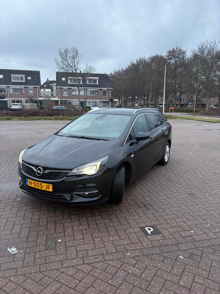 Opel Astra Sport Tourer 1.2 Turbo 110pk 2020 Zwart, Auto's, Opel, Voorwielaandrijving, 1199 cc, Zwart, Stationwagon