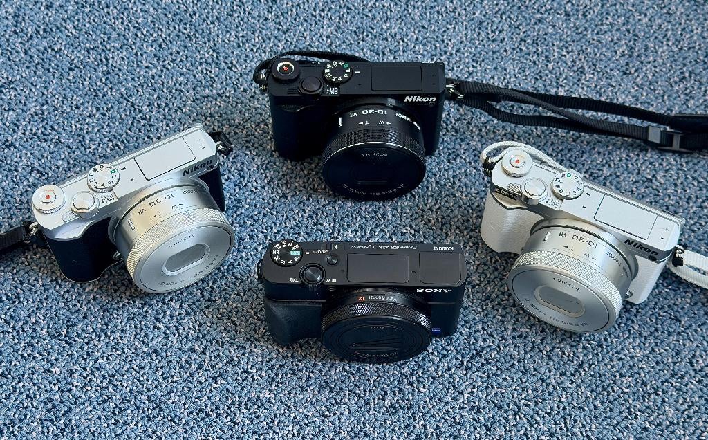 Nikon 1 V/S Sony RX 100, Ophalen of Verzenden, 20 Megapixel, Overige Merken, 4 t/m 7 keer