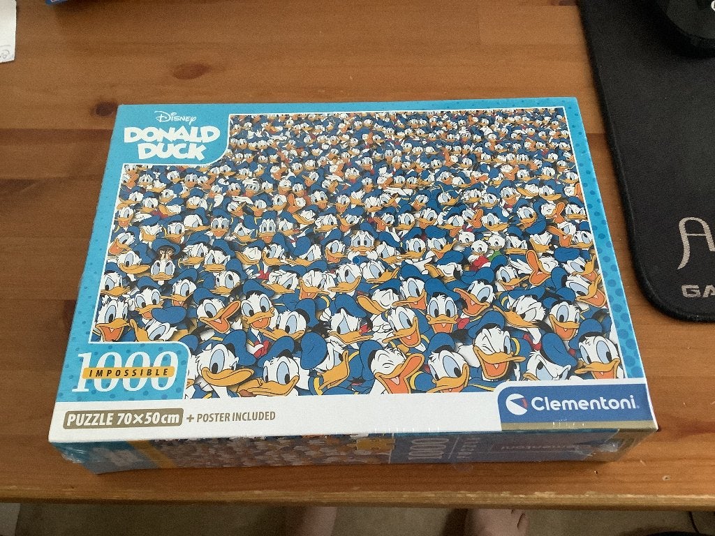 Clementoni impossible puzzle 1000 stukjes Donald Duck Nieuw, Ophalen of Verzenden, 500 t/m 1500 stukjes, Nieuw, Legpuzzel