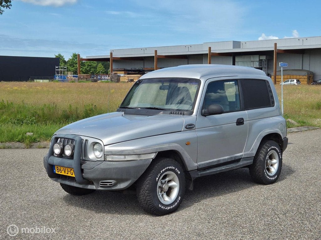 Ssangyong Korando 2.9 TD 4x4 Airco / Export / Vaste prijs, Auto's, SsangYong, Euro 2, Stof, Gebruikt, Korando