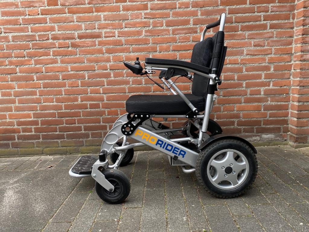 Rolstoel electrische Prorider splitframe, Ophalen, Inklapbaar, Zo goed als nieuw, Elektrische rolstoel