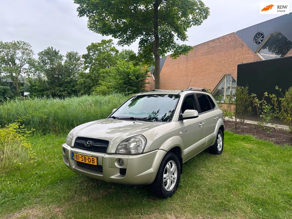 Hyundai Tucson 2.0i 4WD Style Airco Cruise PDC Trekhaak, Auto's, Hyundai, Gebruikt, 4 cilinders, Metallic lak, Bedrijf