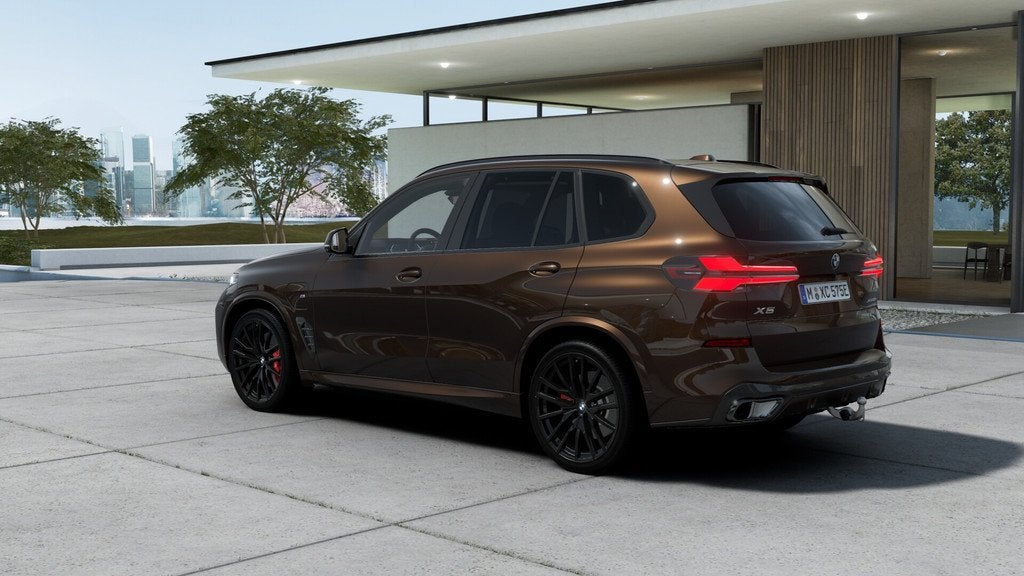 BMW X5 xDrive50e M Sport Automaat / Panoramadak Sky Lounge /, Auto's, BMW, Automaat, X5, 2395 kg, Bruin