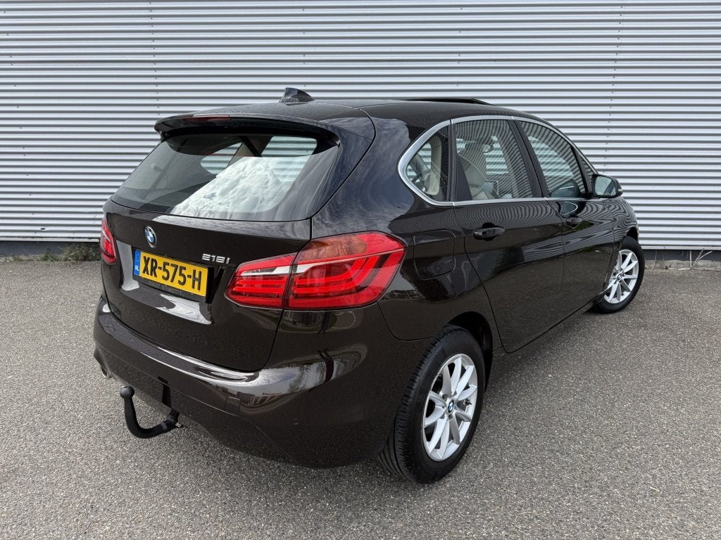 BMW 2 Serie Active Tourer 218i Executive Automaat NAP Pano T, Auto's, BMW, Gebruikt, Euro 6, Bruin, Bedrijf