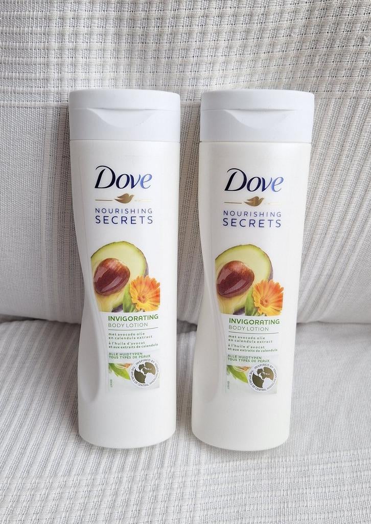 NIEUW! 2 flessen Dove body lotion, Ophalen of Verzenden, Nieuw, Bodylotion, Crème of Olie