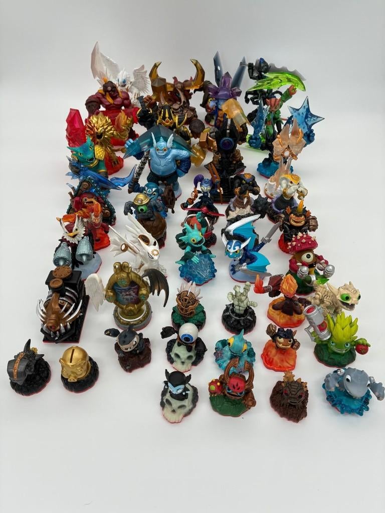Skylanders Trap Team verzameling, Spelcomputers en Games, Games | Nintendo Switch, Zo goed als nieuw, Avontuur en Actie, 2 spelers