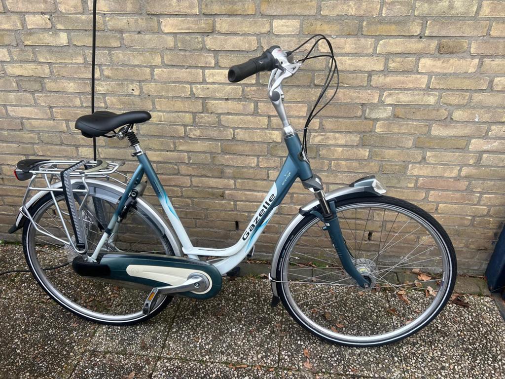 Nette Gazelle orange damesfiets 28inch 57cm, Fietsen en Brommers, Fietsen | Dames | Damesfietsen, Ophalen, Versnellingen, 56 cm of meer