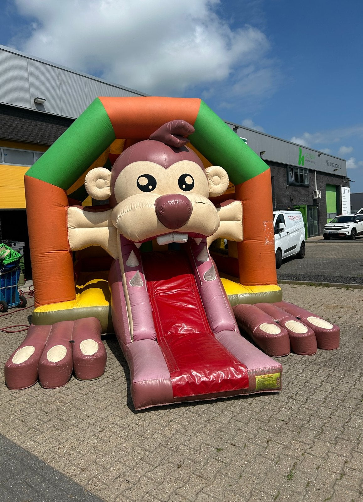 Springkussen aap met glijbaan te koop, Ophalen, Gebruikt, Overige