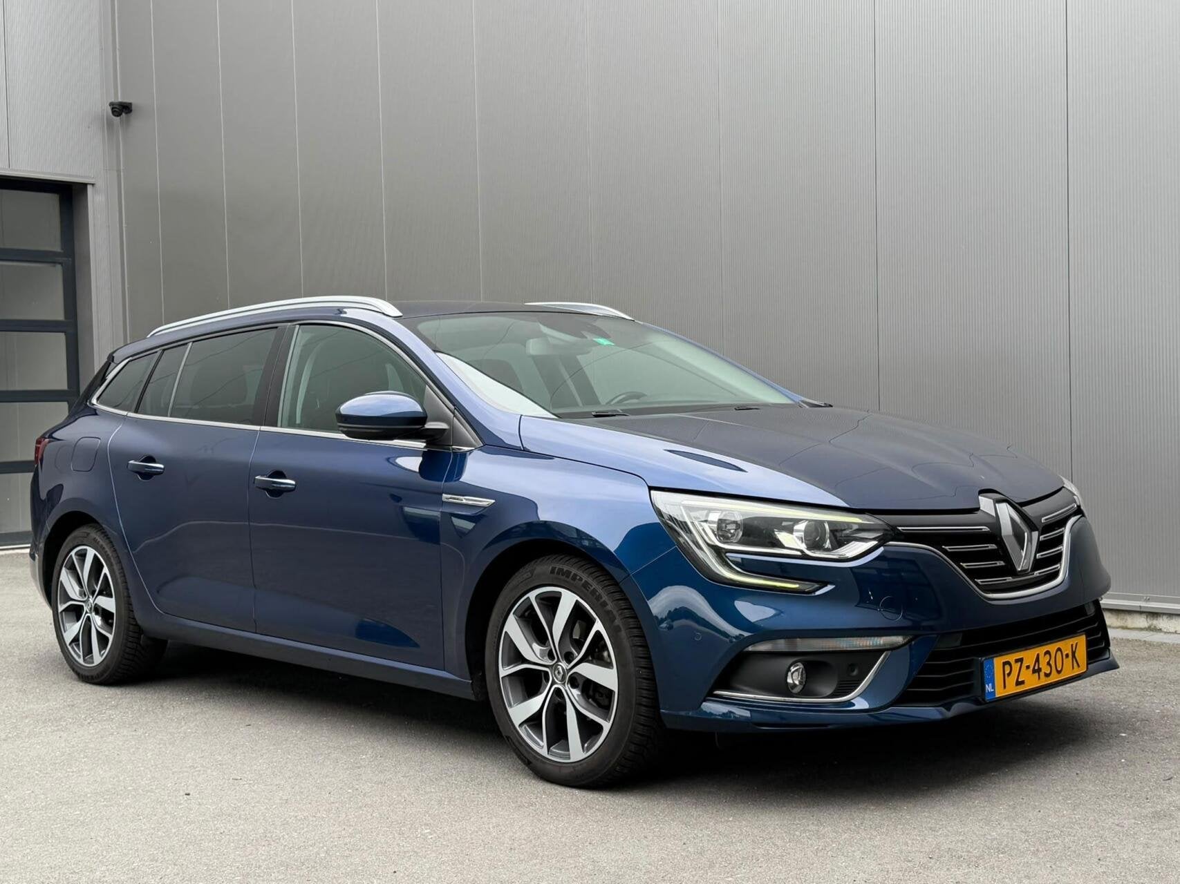 Renault Megane Estate 1.2 TCe Bose, Auto's, Voorwielaandrijving, Gebruikt, 4 cilinders, Blauw