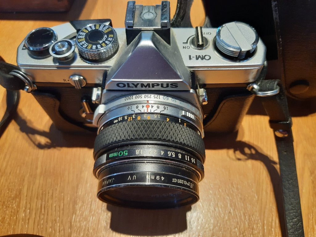Olympus OM-1 met lenzen en Philips flitser 38CT, Ophalen of Verzenden, Gebruikt, Spiegelreflex, Olympus