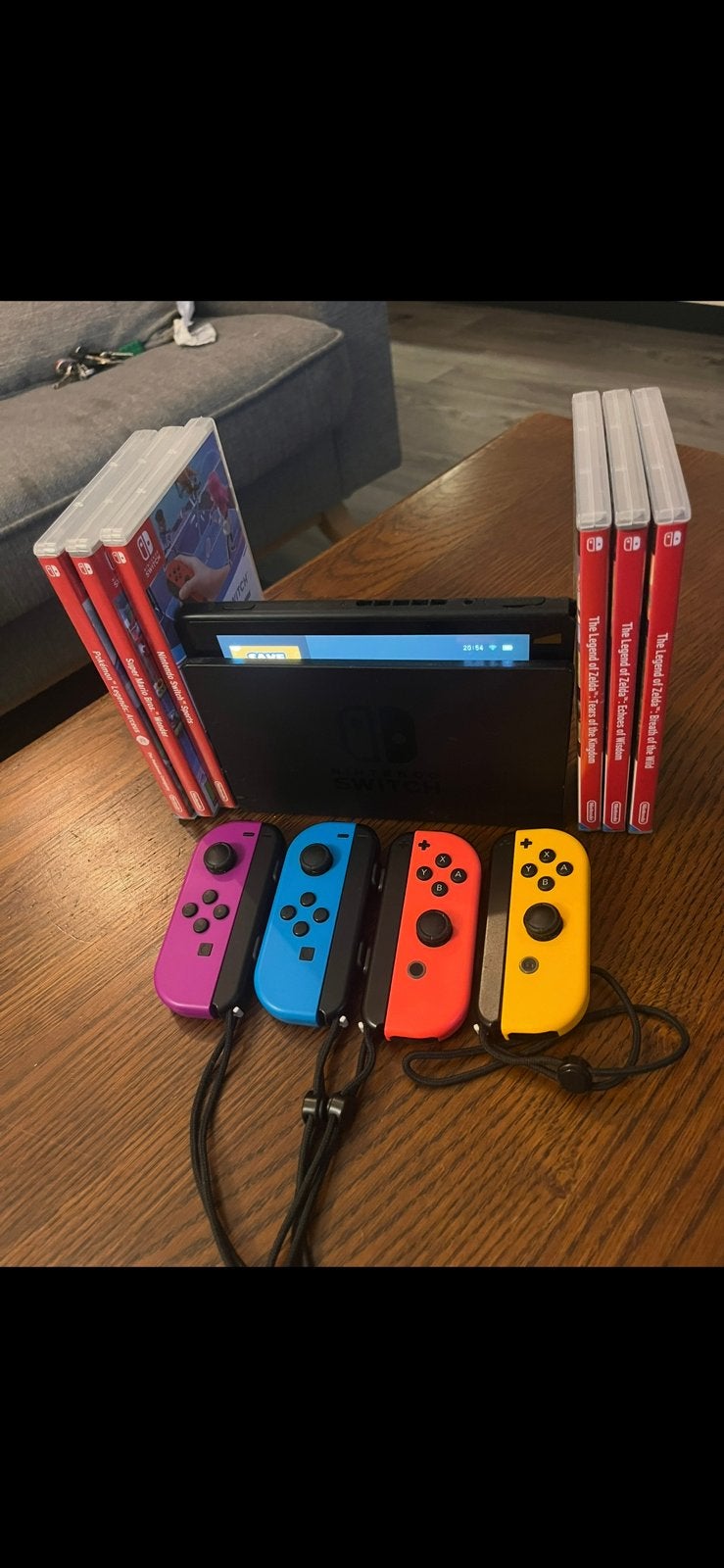 Nintendo Switch compleet + 4 Joy-Cons + 7 games, Ophalen of Verzenden, Zo goed als nieuw, Met 2 controllers, Switch Original