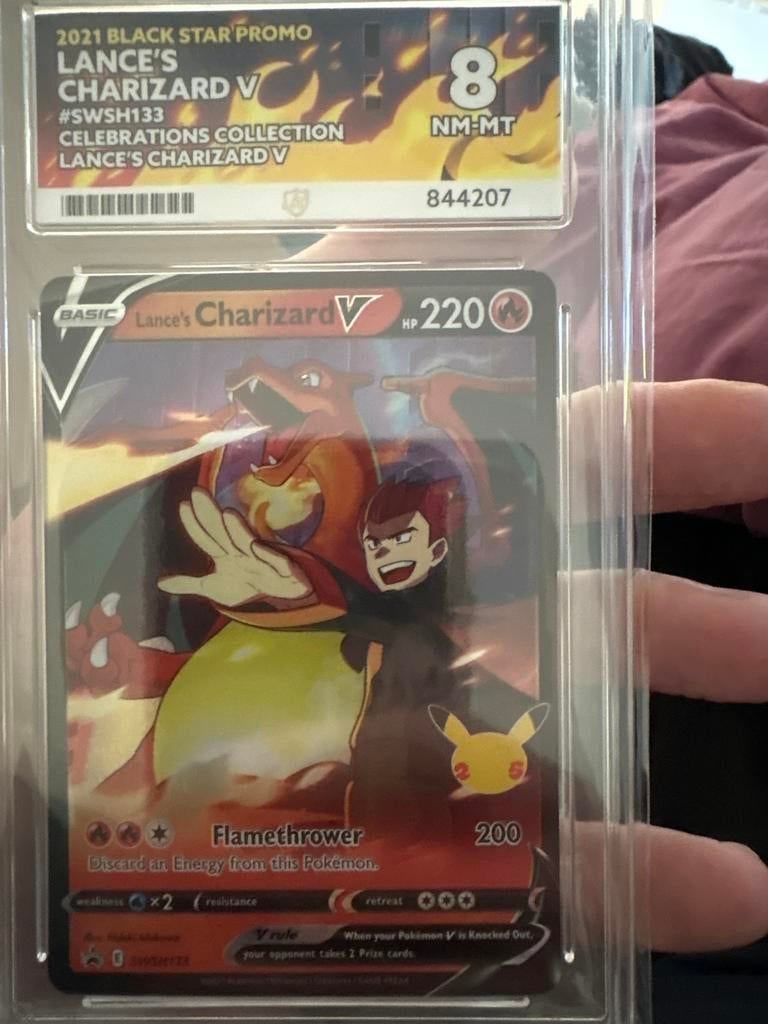 Lance's Charizard V SWSH133 Celebrations ace 8, Ophalen of Verzenden, Zo goed als nieuw, Losse kaart