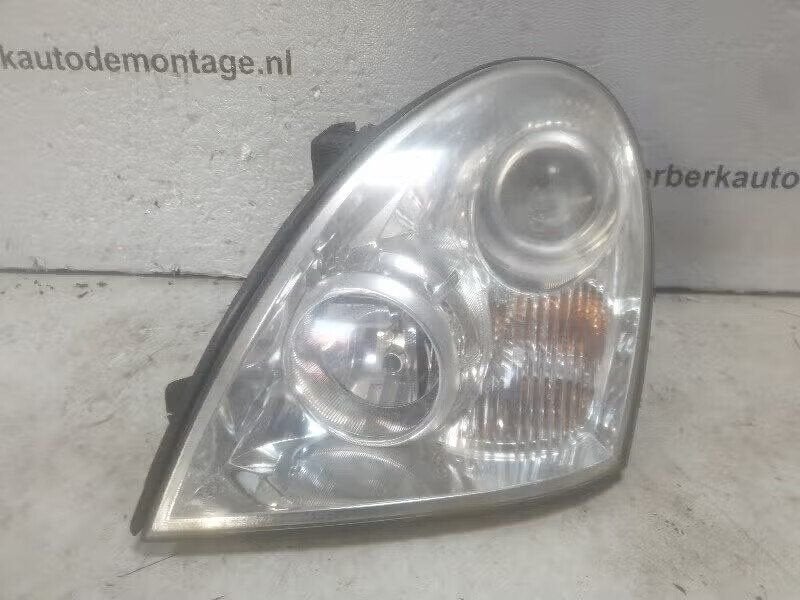 KOPLAMP LINKS SsangYong Rexton (01-2002/04-2013), Gebruikt, Ophalen of Verzenden, Ssangyong Motors Middle Europe, Ssangyong