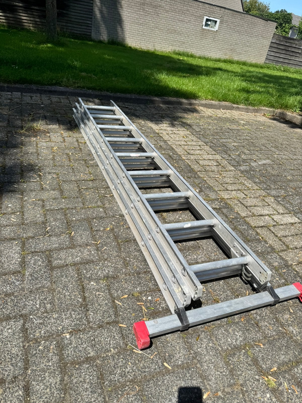 Professionele 3x9 ladder met stabiliteitsbalk, Ophalen, Zo goed als nieuw, 4 meter of meer