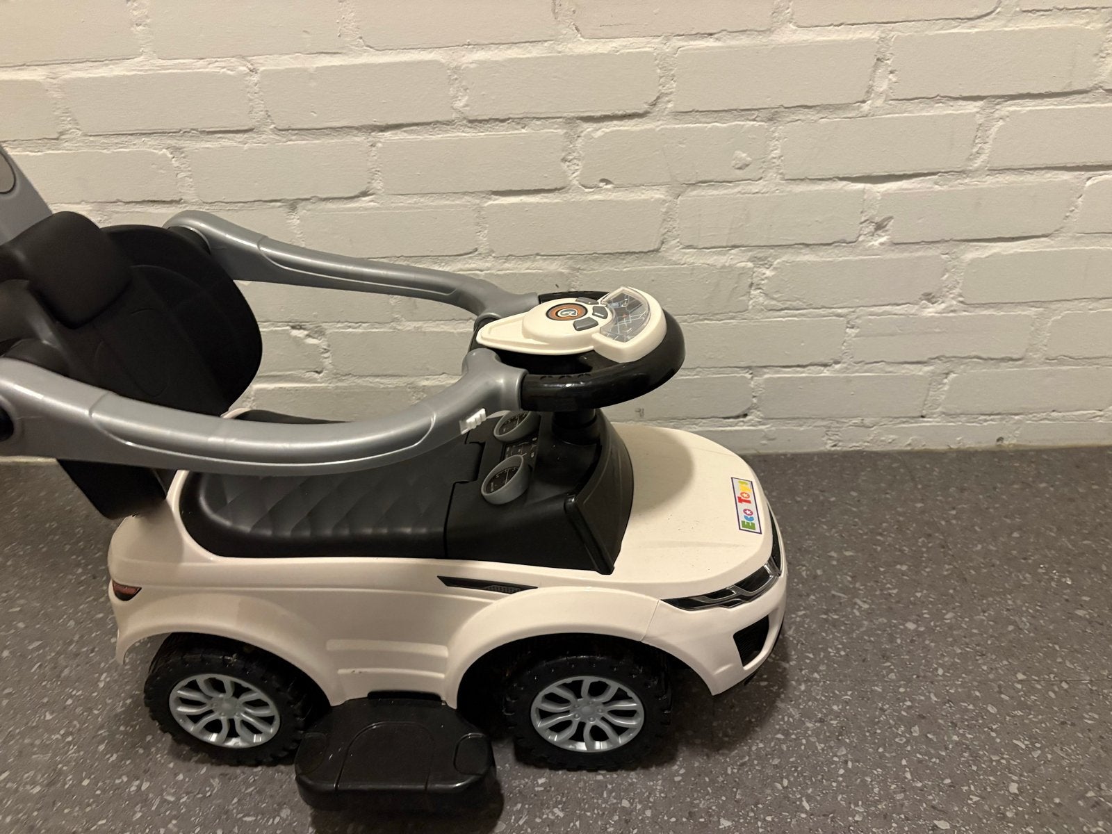 Eco Toys Loopauto met duwstang., Ophalen of Verzenden, Gebruikt, Loopvoertuig