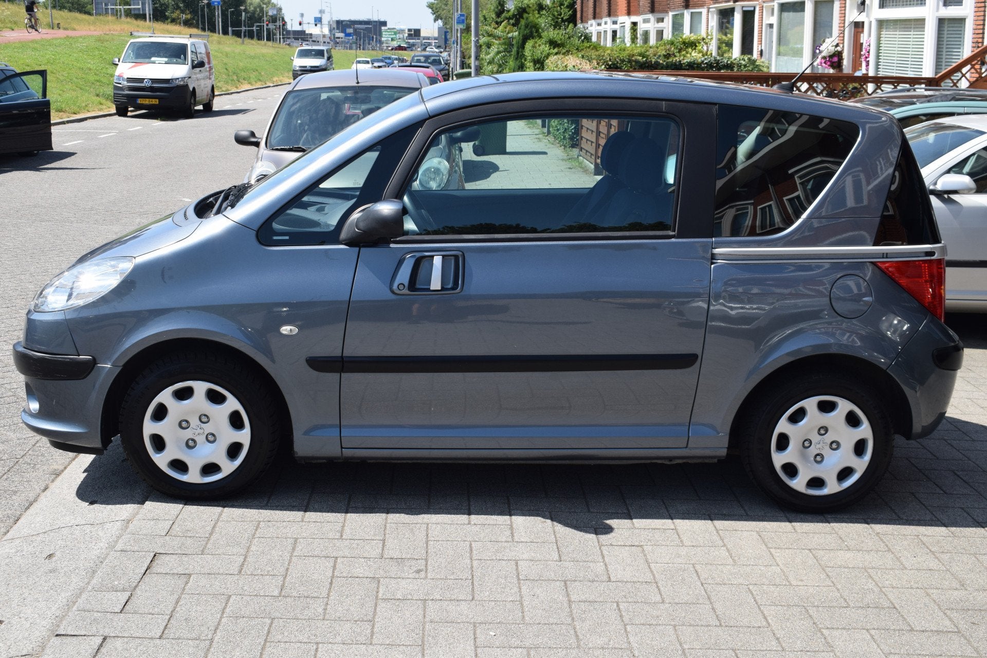 Peugeot 1007 1.4 Urban 87.939km nap (bj 2006), Auto's, Peugeot, Voorwielaandrijving, Stof, 4 cilinders, 4 stoelen