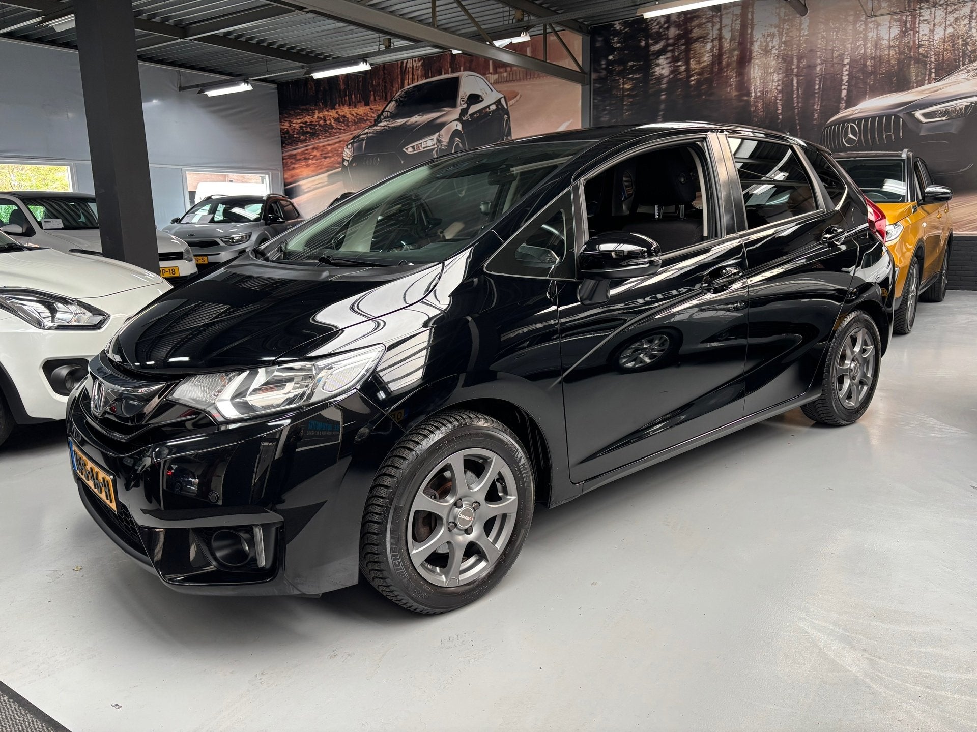 Honda JAZZ 1.3 i-VTEC Elegance / Camera / Navi / Stoelverwar, Voorwielaandrijving, Gebruikt, 4 cilinders, Met garantie (alle)