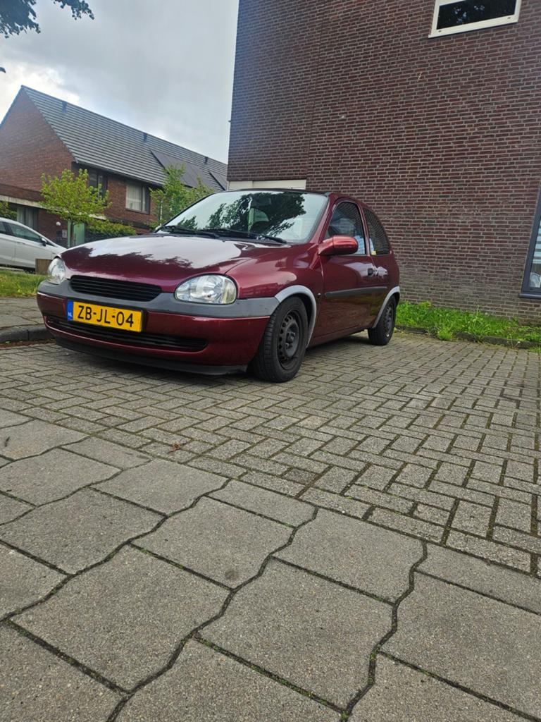 Opel Corsa 1.2 I 16V 3D 1999 Rood, Auto's, 850 kg, Origineel Nederlands, Handgeschakeld, Grijs