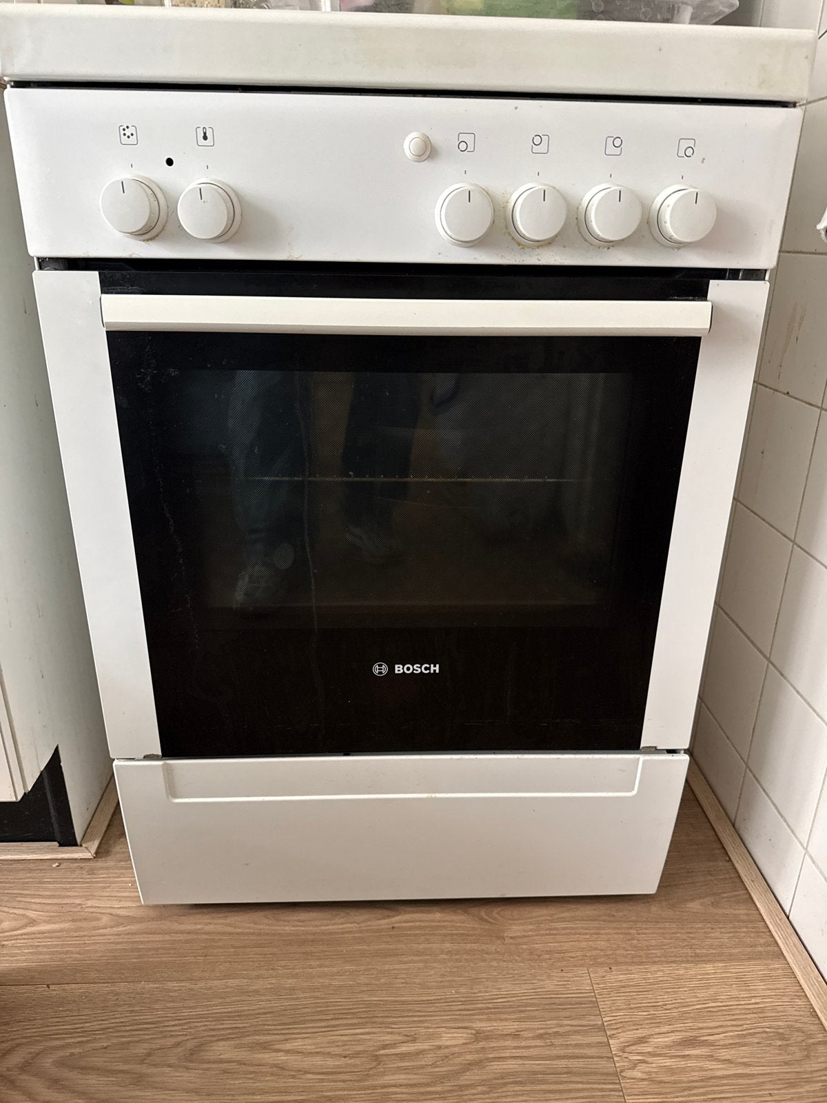 Bosch gasfornuis met 4 pitten en oven, Ophalen, Gebruikt, 4 kookzones, Gas