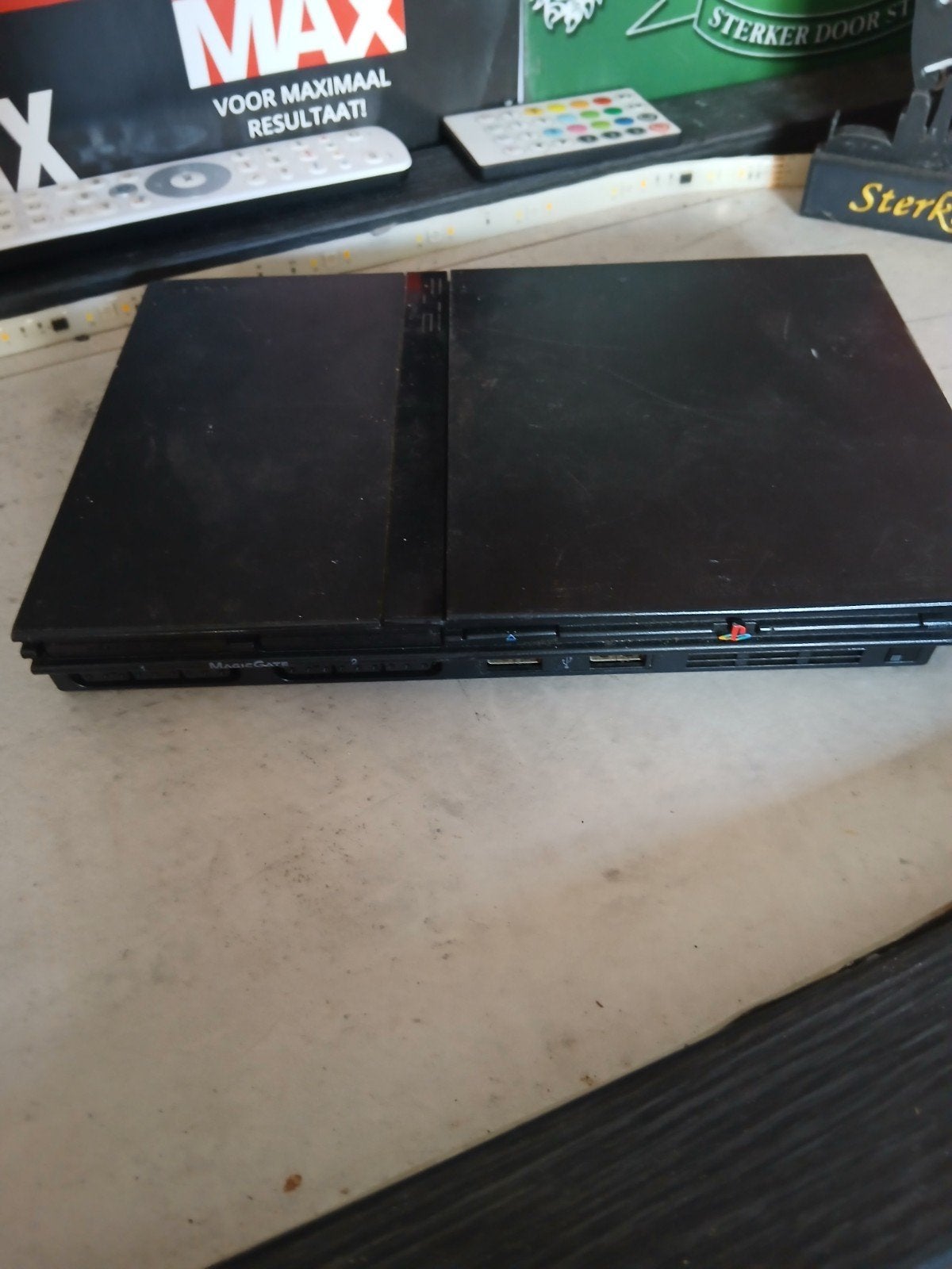 PlayStation 2 Slim Console (Zonder kabels/toebehoren), Ophalen