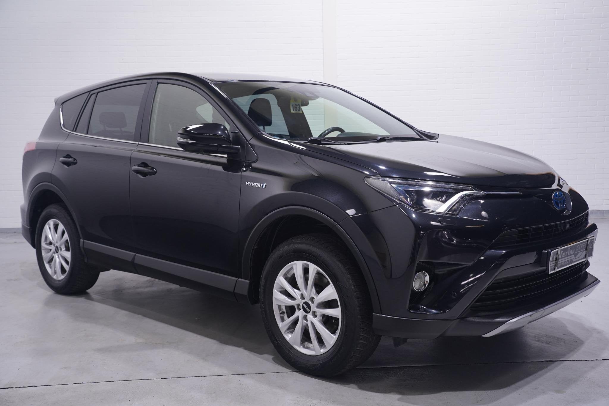Toyota RAV4 2.5 Hybrid AWD Dynamic navigatie lederen-bekledi, Auto's, Toyota, Automaat, Dealer onderhouden, Gebruikt, Euro 6