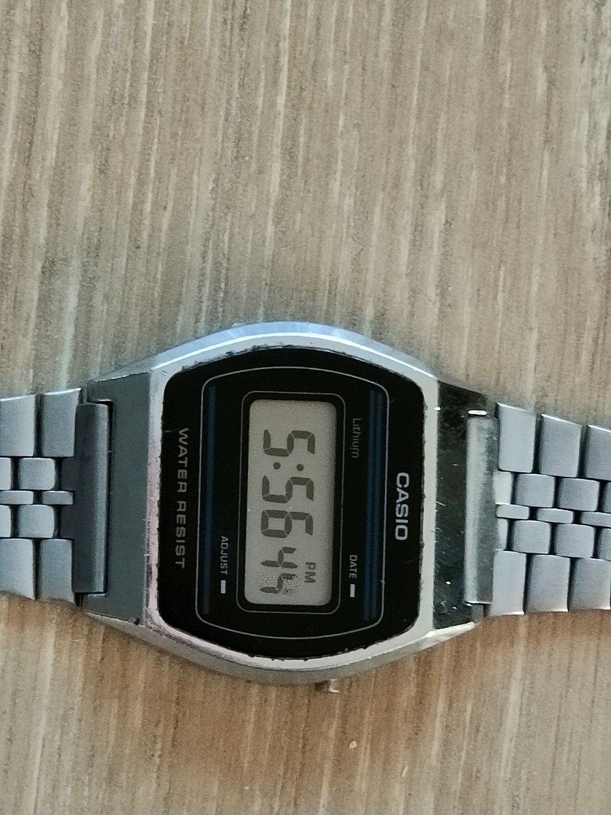 Vintage LCD digital quartz herenhorloge Casio B612W., Staal, Met bandje, Polshorloge, 1960 of later