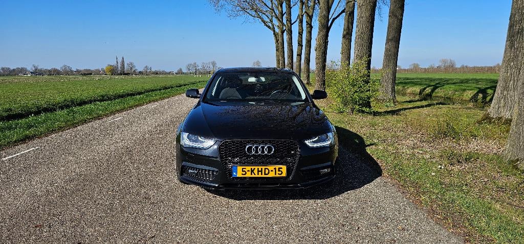 Audi A4 1.8TFSI 125KW 2013 Zwart, Auto's, Voorwielaandrijving, Stof, Zwart, 4 cilinders