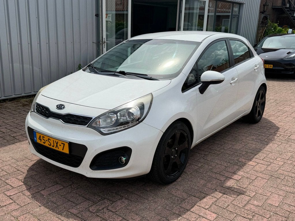 Kia Rio 1.2 CVVT Super Pack EXPORT, Auto's, Euro 5, 4 cilinders, Wit, Origineel Nederlands