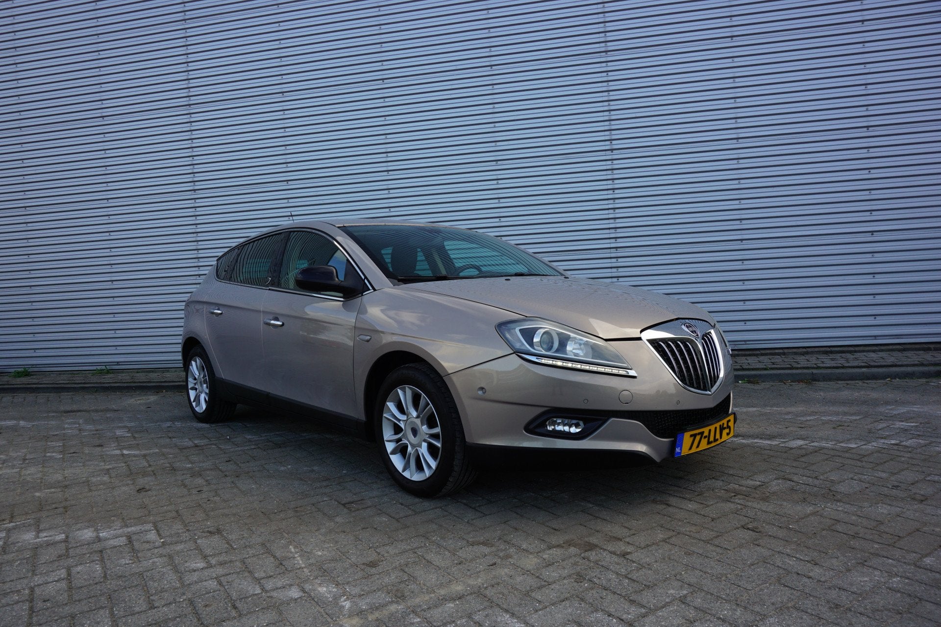 Lancia Delta 1.4-16V Oro Climate / Navi / Cruise / Parkeers, Auto's, Voorwielaandrijving, Parkeersensor, Gebruikt, 1295 kg