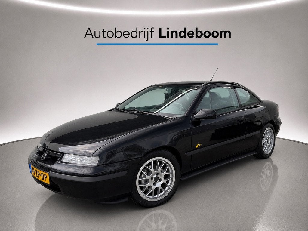 Opel Calibra 2.0i-16V DTM Edition 0653 Irmscher verlagings s, Auto's, 1998 cc, Zwart, 4 cilinders, Zwart