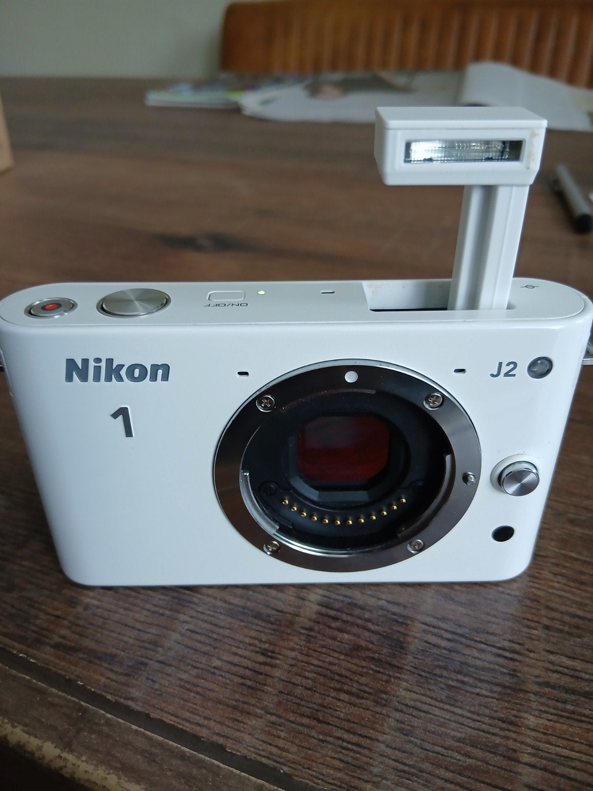 Nikon 1 J2 Systeemcamera body Wit - Werkt perfect, goede acc, Ophalen of Verzenden, Zo goed als nieuw, Accu, Nikon