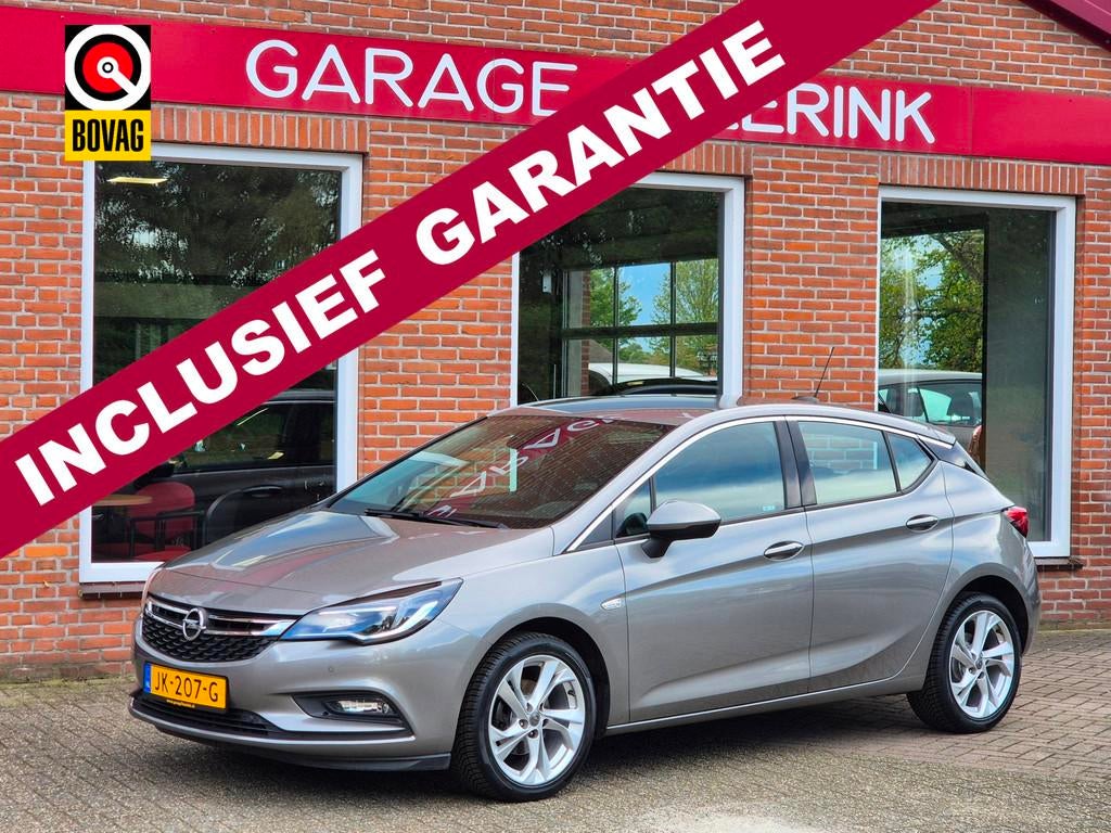Opel Astra 1.0 Innovation 105PK 5drs clima, cruise, navi, pd, Auto's, Opel, Gebruikt, Euro 6, Bruin, 23 km/l