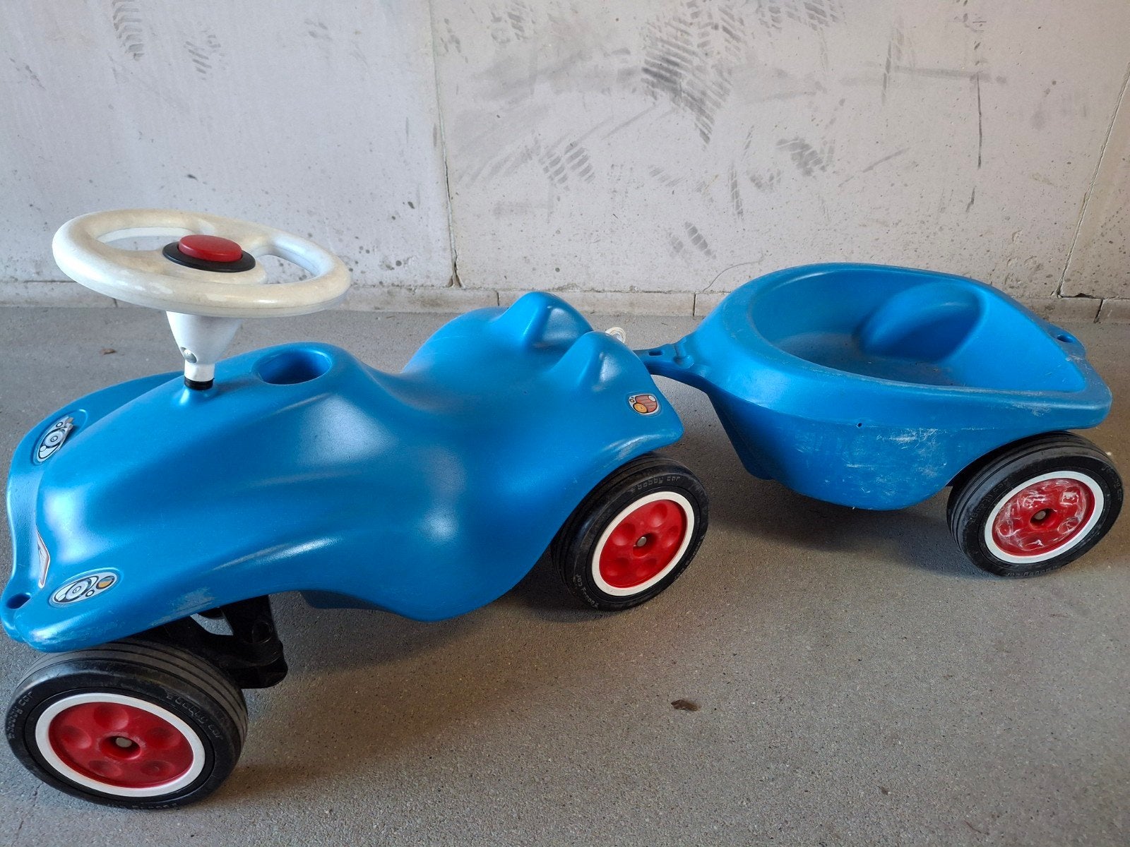 Blauwe loopauto met aanhangwagen, Ophalen of Verzenden, Gebruikt, Loopvoertuig