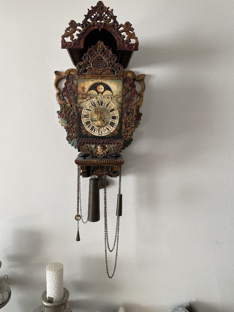 Friese stoelklok replica, Ophalen