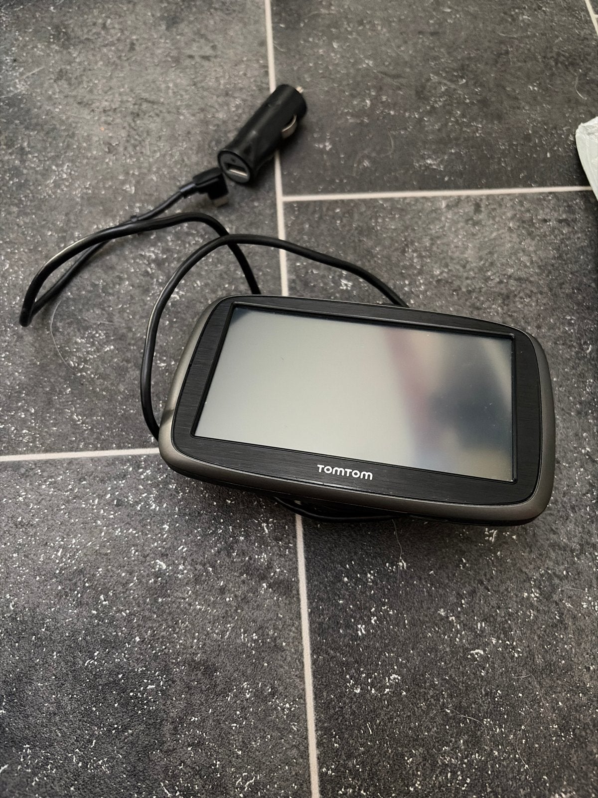 TomTom navigatiesysteem met oplader en zuignap, Ophalen of Verzenden, Gebruikt